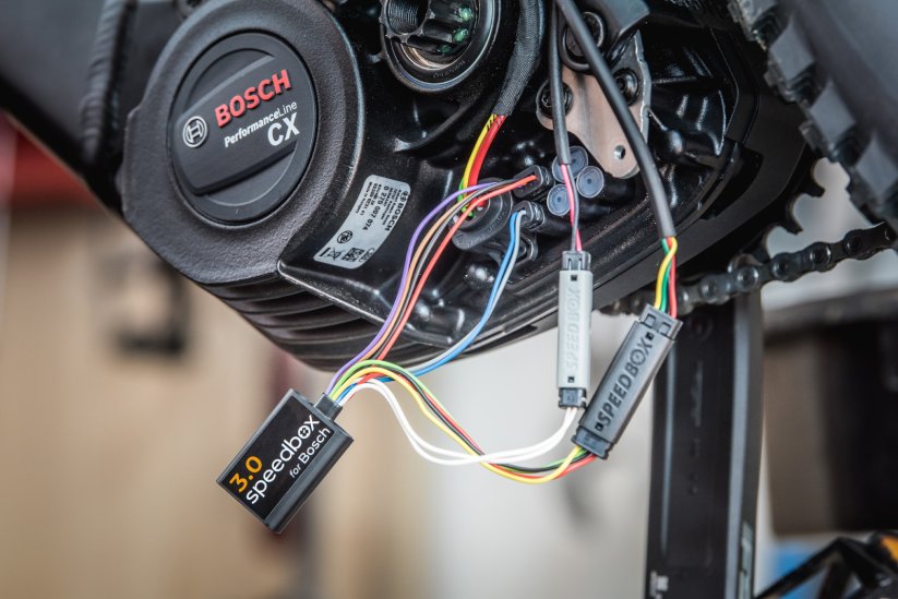 SpeedBox 3.0 tuning chip installed in a Bosch e-bike motor