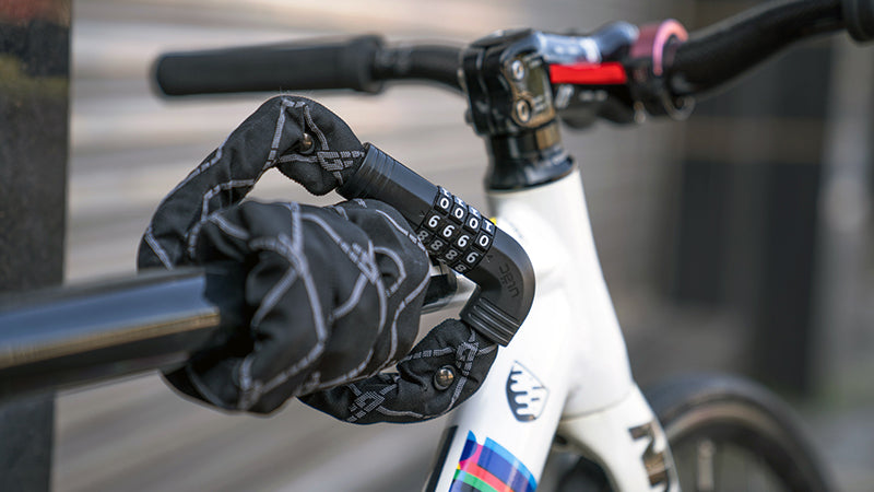Ulac Steel Kombat chain lock wrapped around a bicycle top tube
