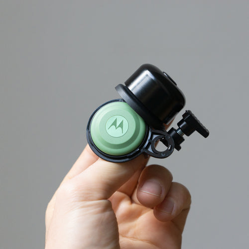 AirBell moto tag bell in hand