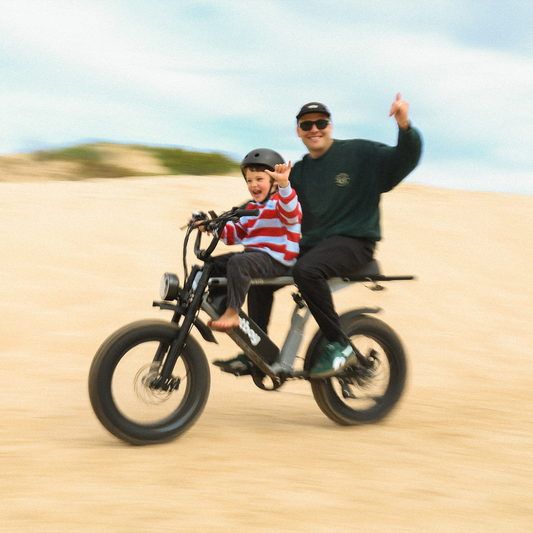 Fatboy Grom child seat and walnut foot pegs on a Bagus V2