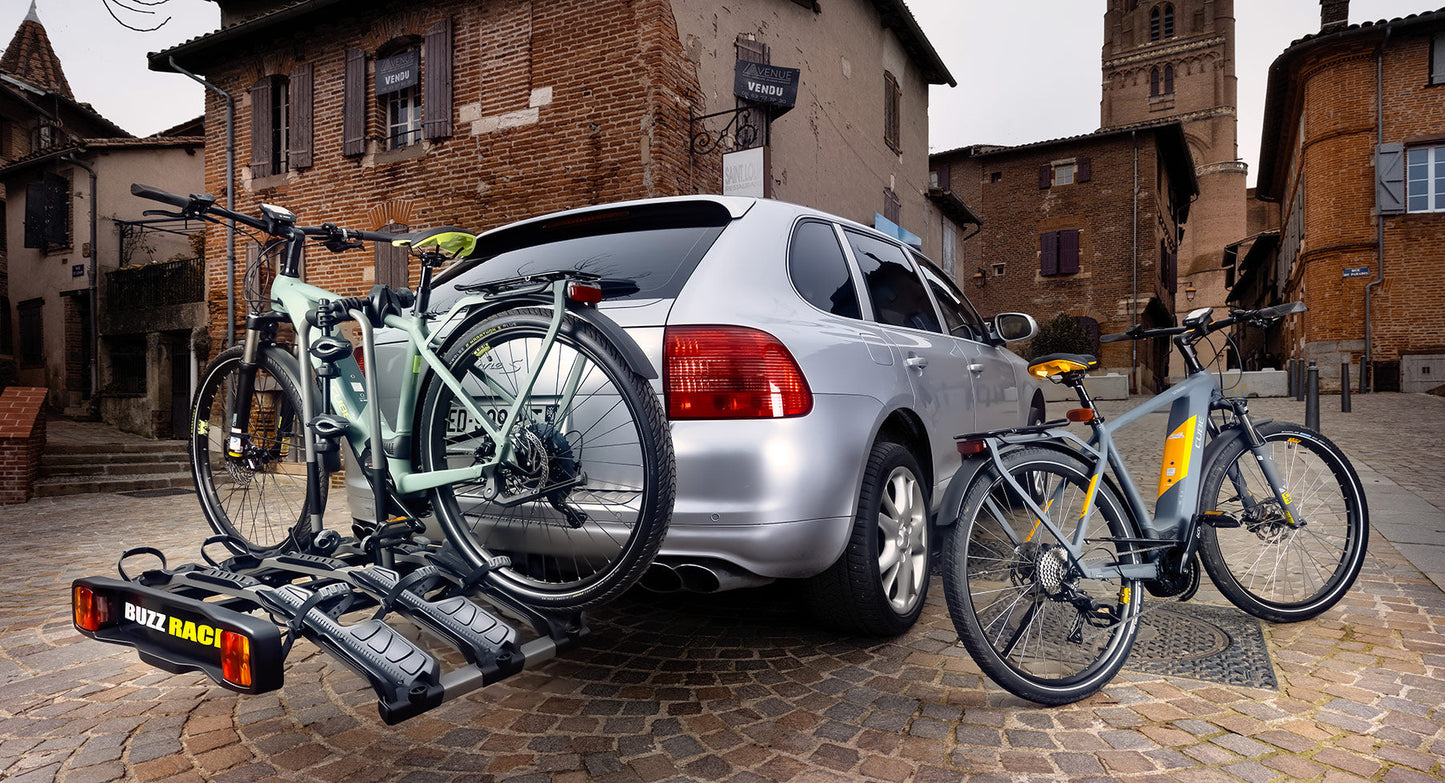 Buzzrack E-Hornet 3 carrying e-bikes on the road