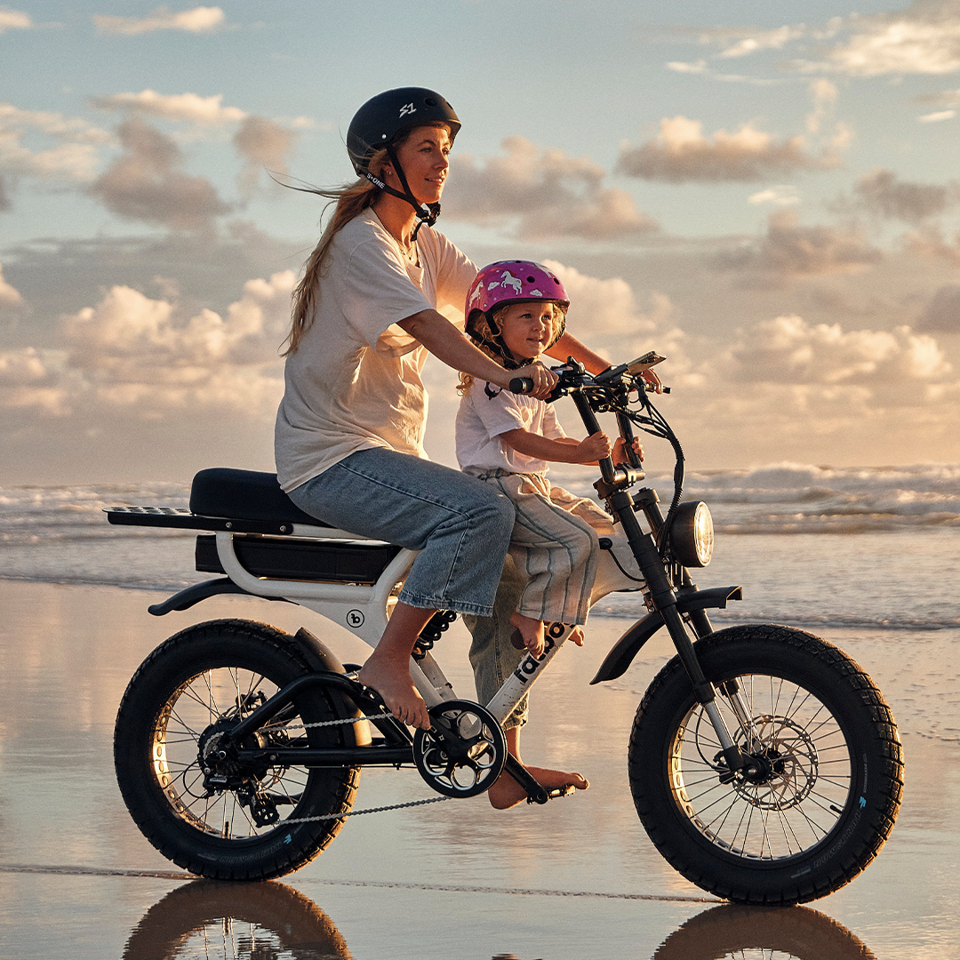 Fatboy Grom child seat and walnut foot pegs on a Scrambler V2