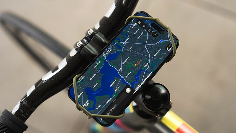 Ulac Spyder 360 holding a smartphone on bike handlebars