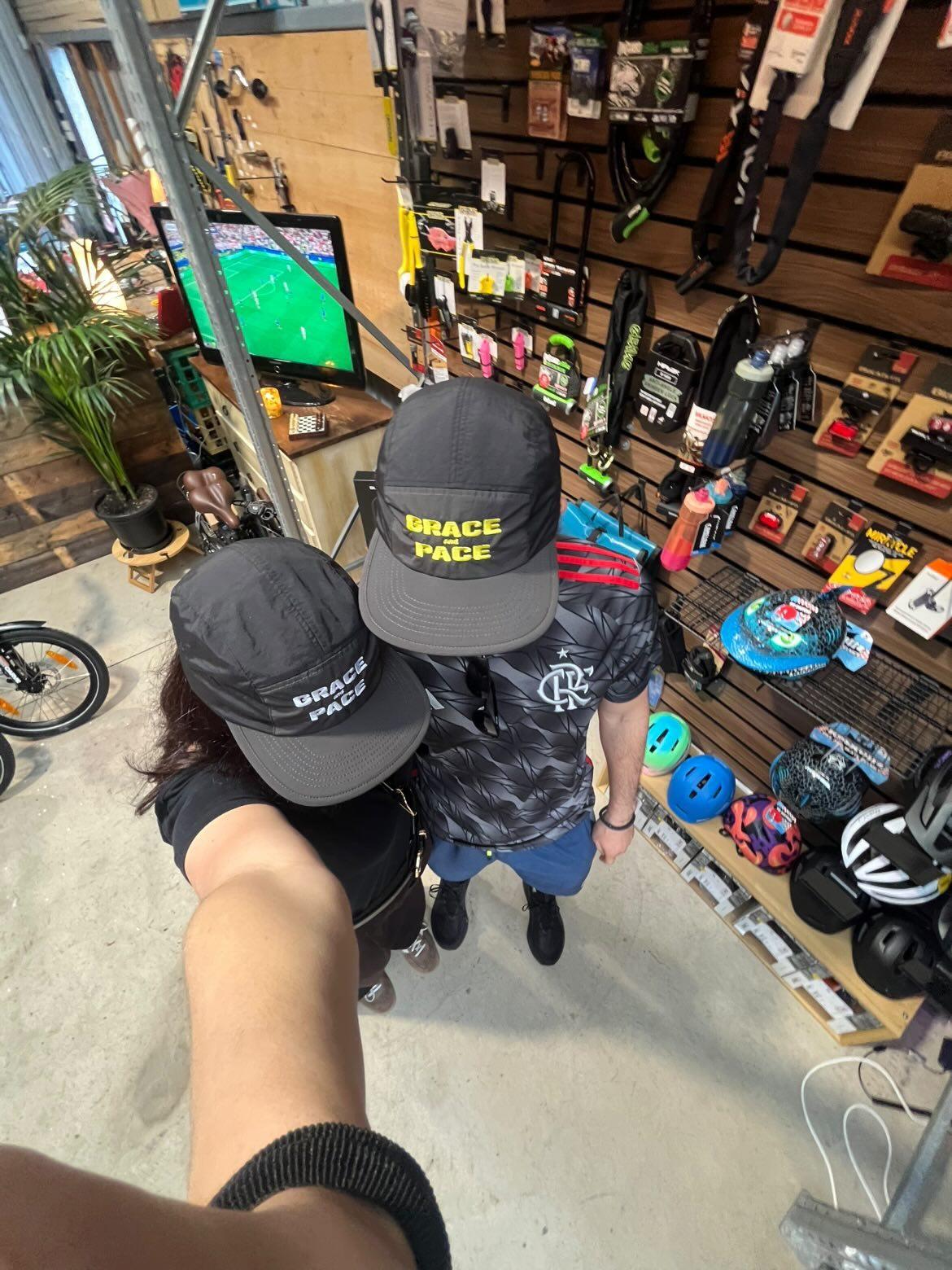 Grace and Pace 5-Panel Caps in Black/Coal with yellow and white embroidery