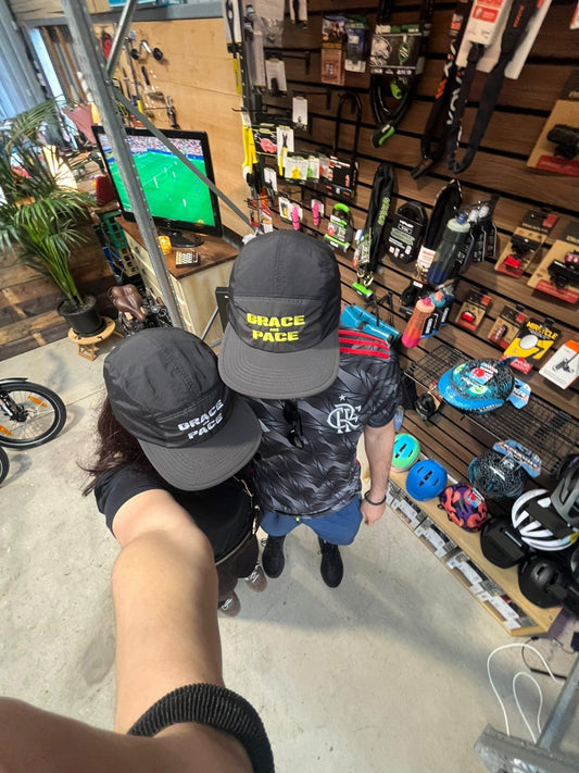 Grace and Pace 5-Panel Caps in Black/Coal with yellow and white embroidery