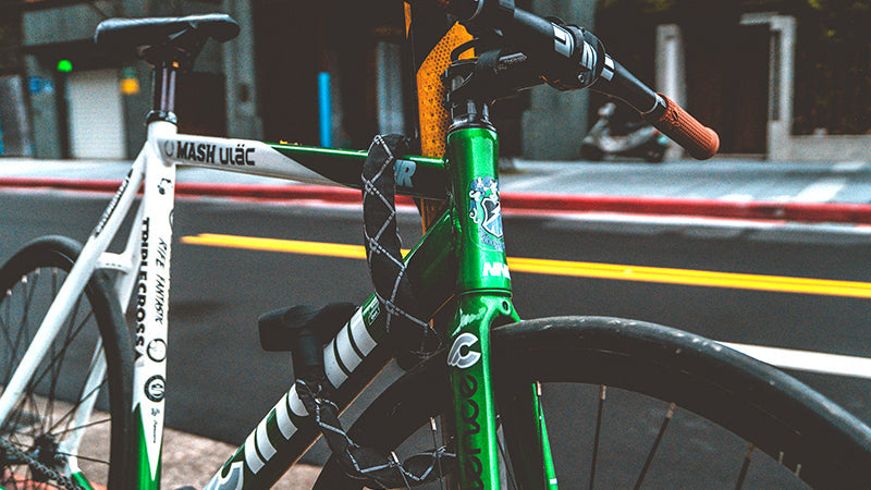 Ulac Diesel chain lock securing a bike in an urban setting