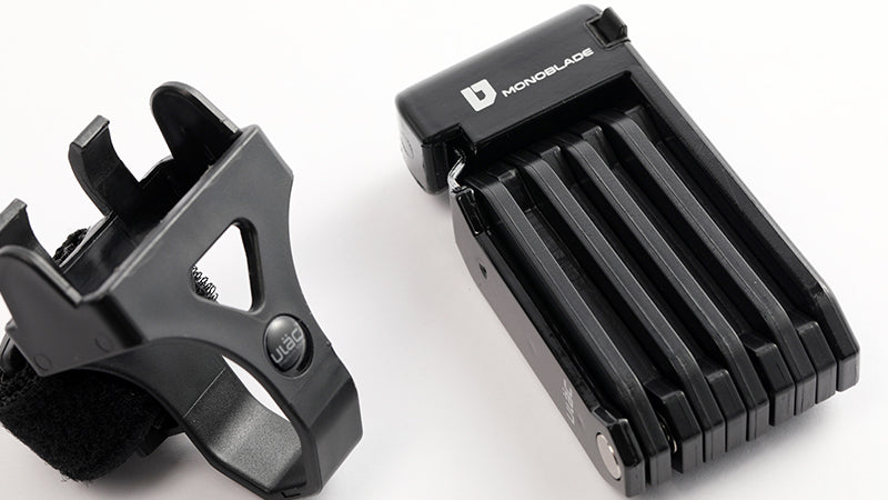 Ulac Monoblade folding lock securing a bike