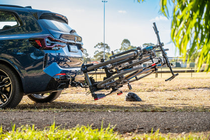 Buzzrack E-Scorpion 2 tilted down for boot access with bikes loaded