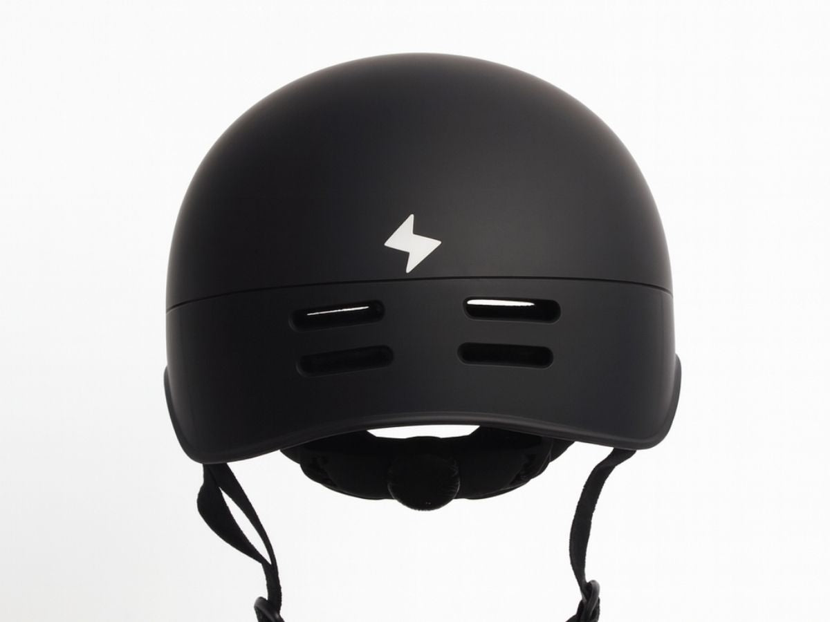 Vamos Bike Helmet black side profile with logo
