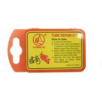 Puncture repair kit with patches, rasp and rubber solution
