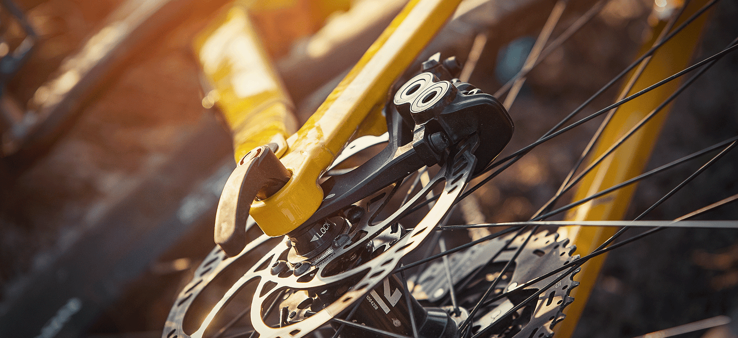 Magura MT5 4-piston caliper mounted on a mountain bike rear wheel