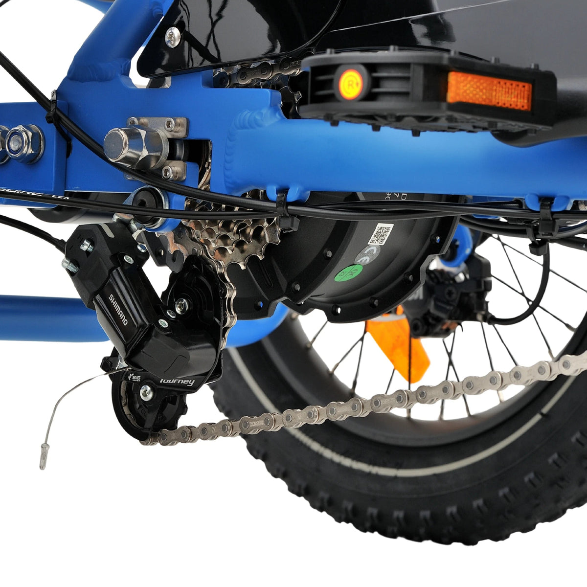Ridewave Koala electric trike drivetrain close-up with chain, pedal and rear wheel