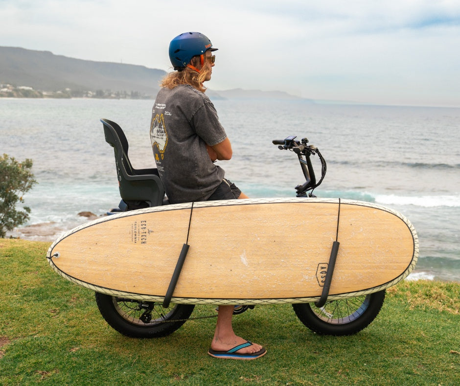 Vamos two-piece surfboard rack mounted on an e-bike